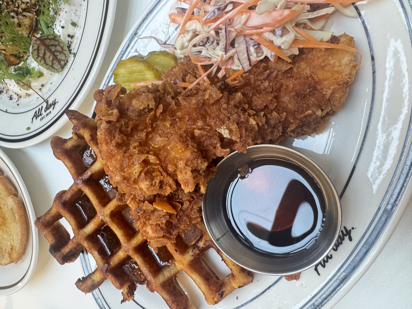 Fried chicken and waffles with syrup, photographed by Mazin